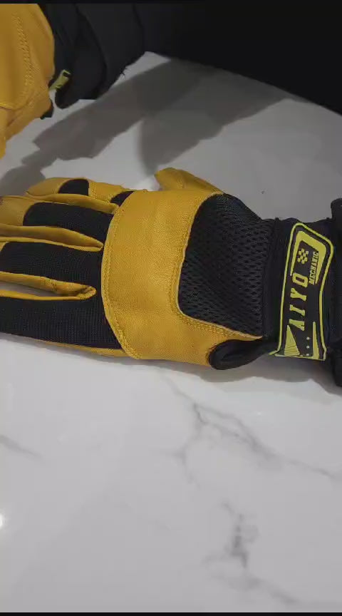 Durable and stylish Master Safety Gloves in a striking yellow and black combination, featuring Gost crust leather palms for toughness. Ideal for DIY, gardening, labor, construction, and roofing tasks, ensuring reliable hand protection during vigorous activities.